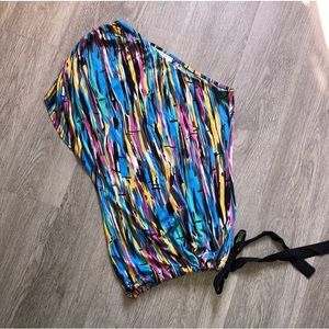 One shoulder brightly colored top